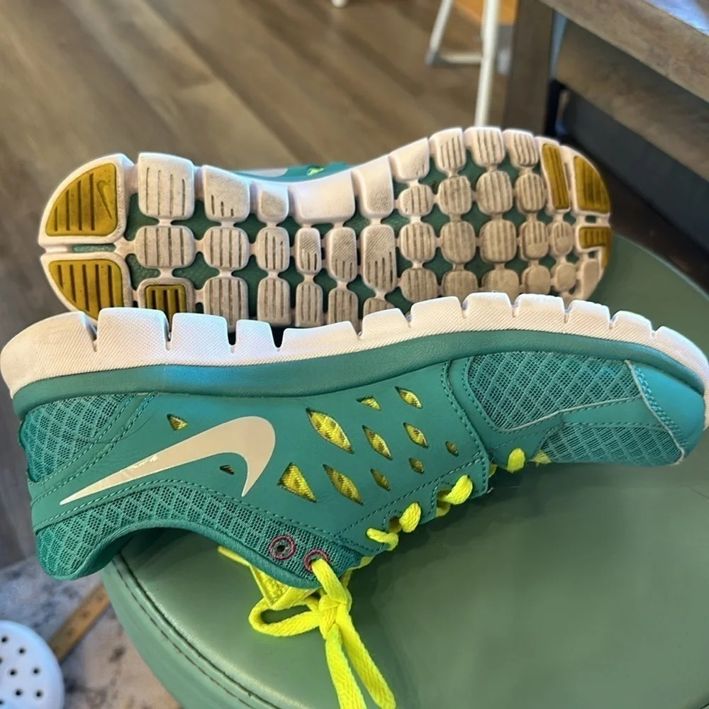 Nike running shoes, aqua blue, yellow, white size 9.5